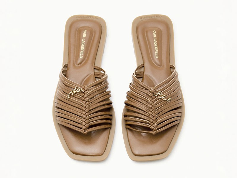 Chanclas artesanales con tramas abiertas y suelas planas