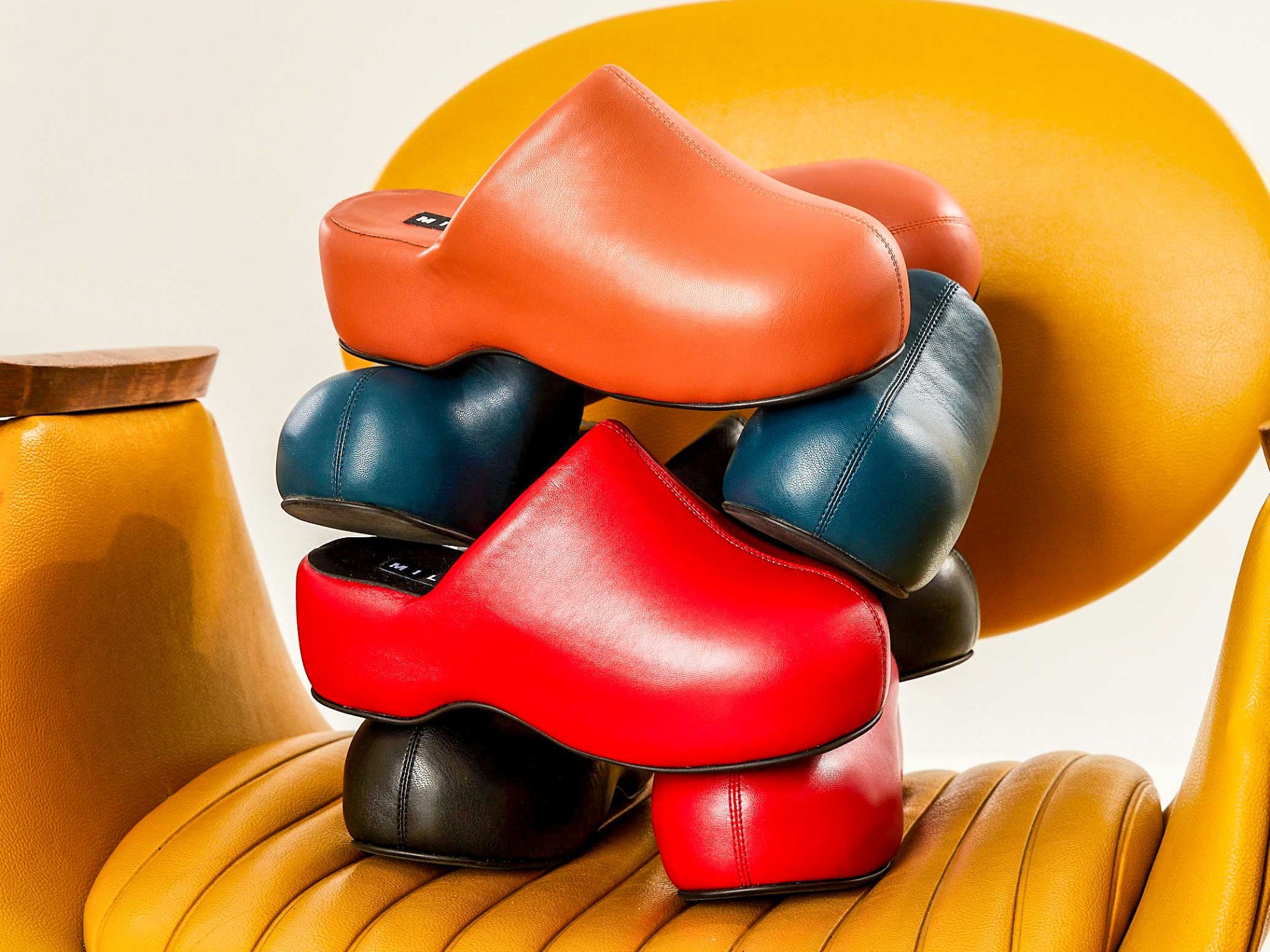 Simply different. SIMON MILLER clogs and platforms