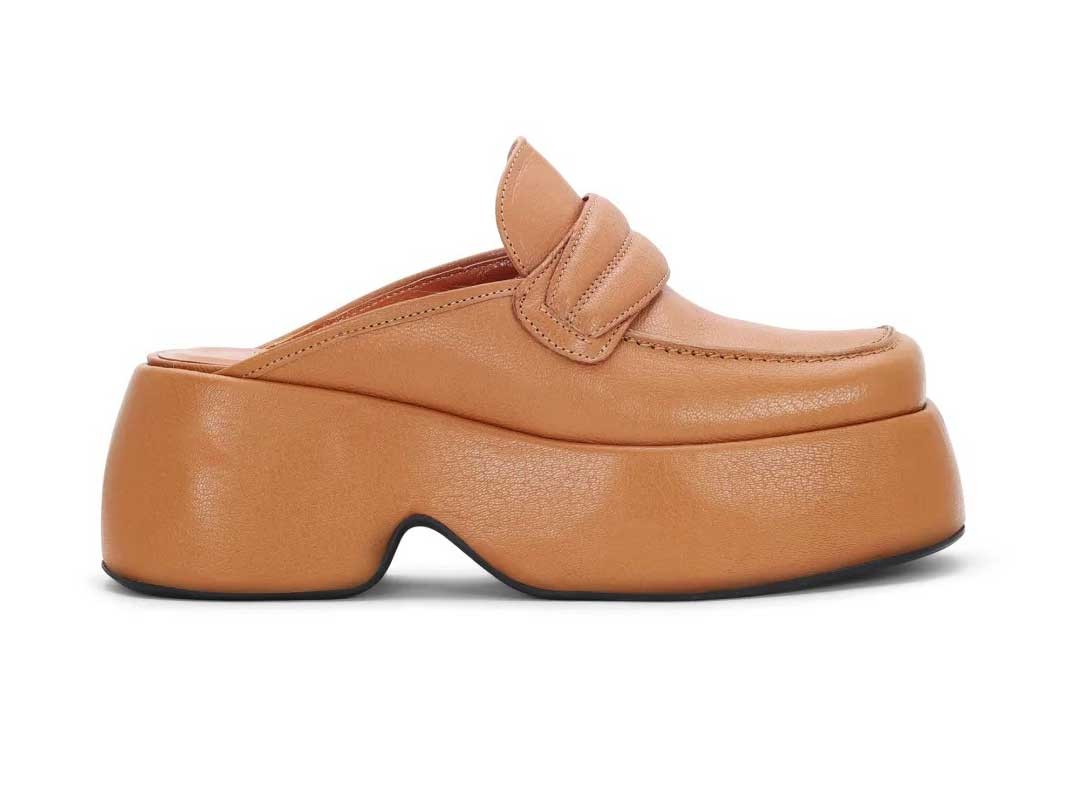 Simply different. SIMON MILLER clogs and platforms