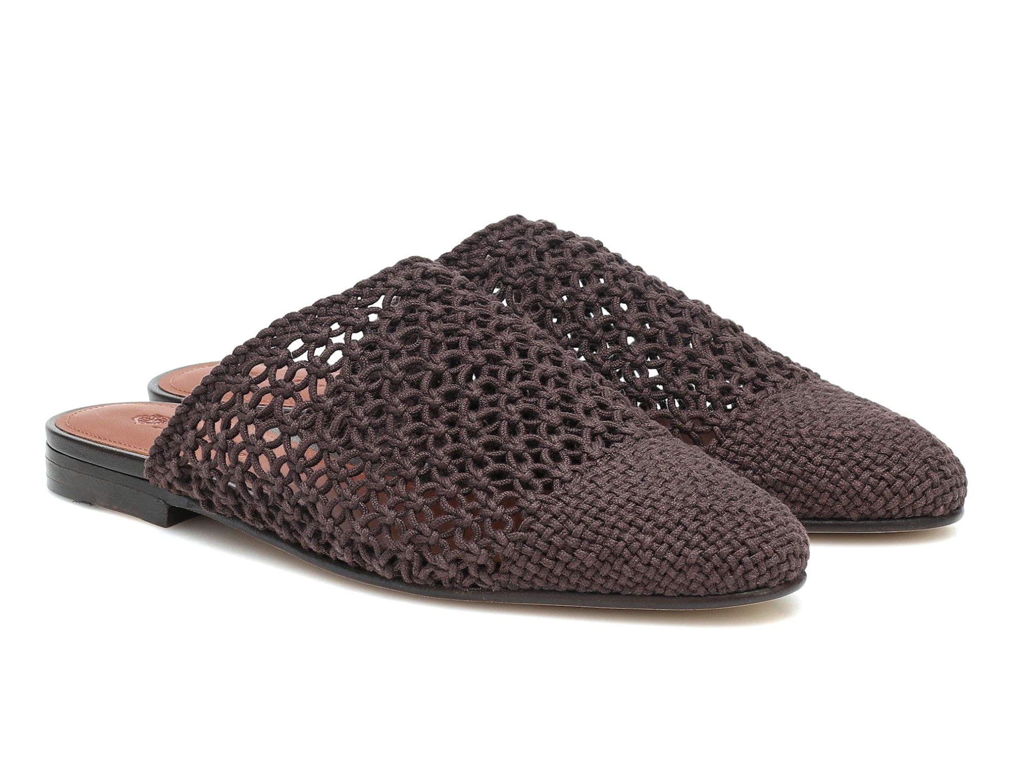 Flat mules with interwoven uppers